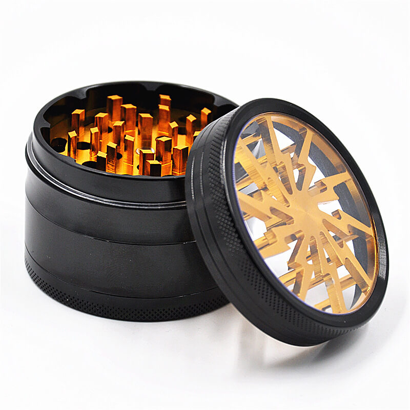 Metalen grinder met zeef en opvangbakje voor wiet
