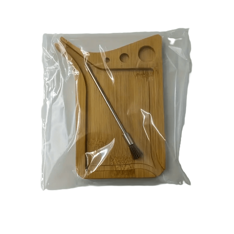 Verpakking van de Bamboo Mini Tray: De Bamboo Mini Tray verpakt in een plastic zak, inclusief een reinigingsborstel en hulpmiddelen.